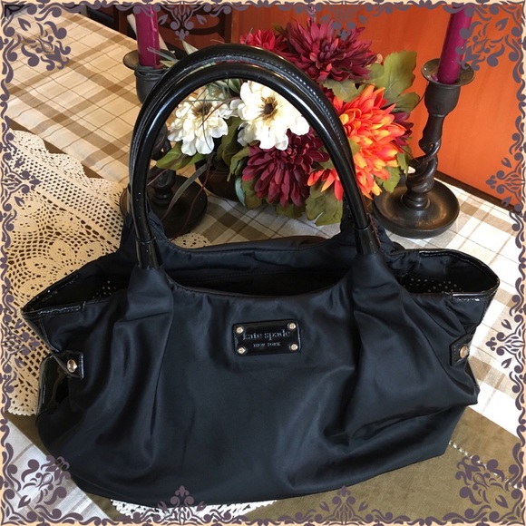 kate spade Handbags - Kate Spade Black and White Dotted Stevie Hobo Bag